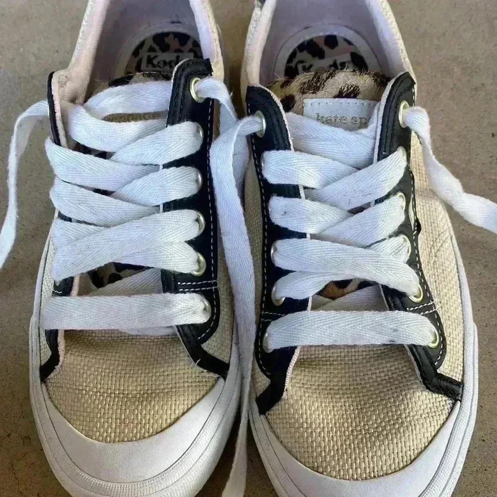 Keds beige canvas sneakers with black trim and leopard heel